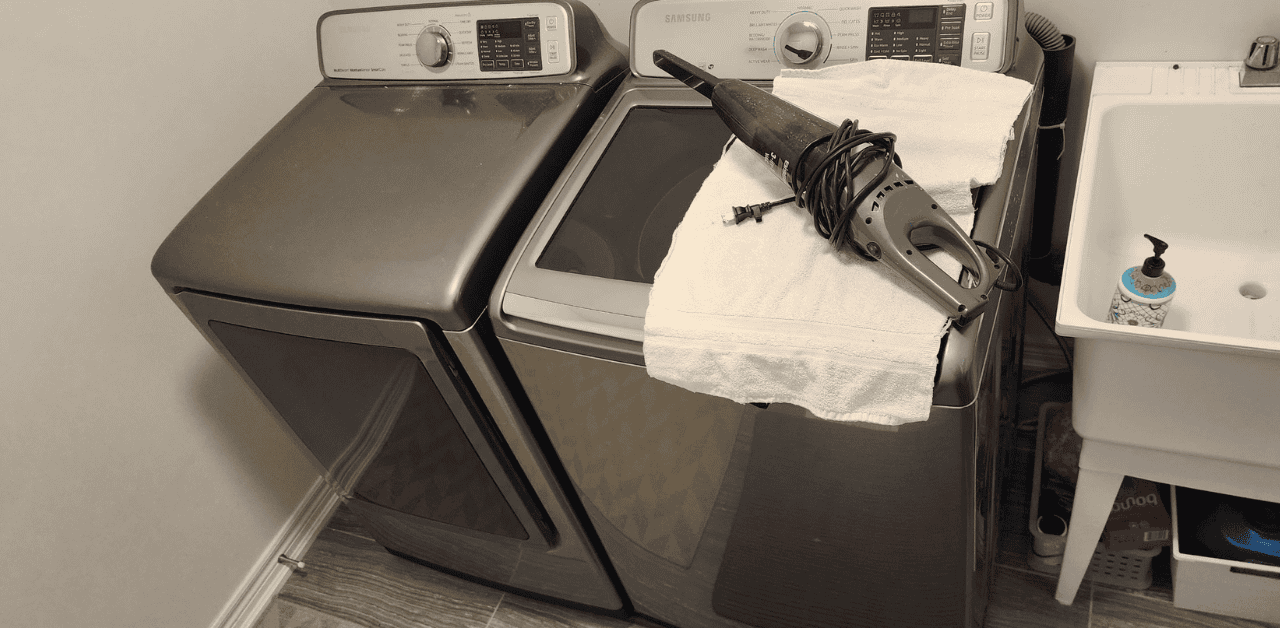 The technician is about to check the thermistor and thermost during the dryer fix