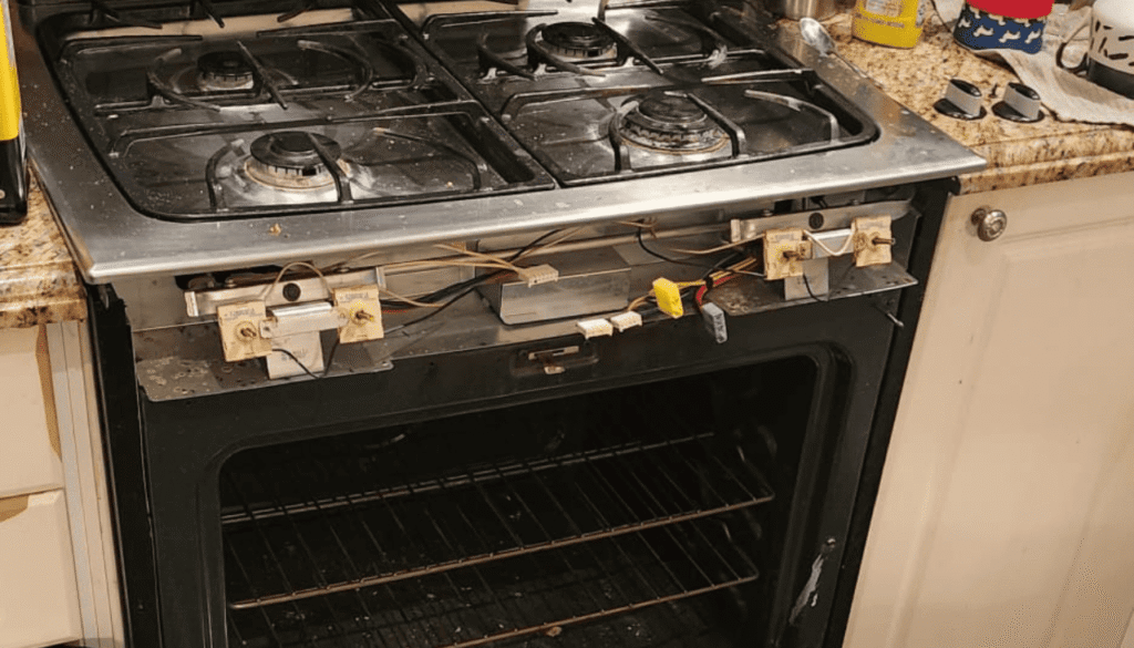 Oven panel removed for knob replacement