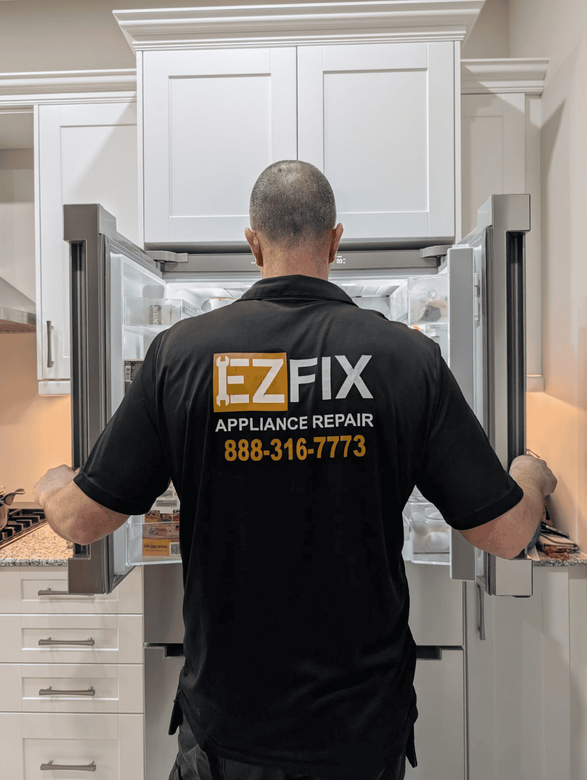 Ezfix technician examining a borken fridge
