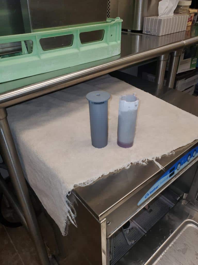 EZFIX technician conducting appliance maintenance